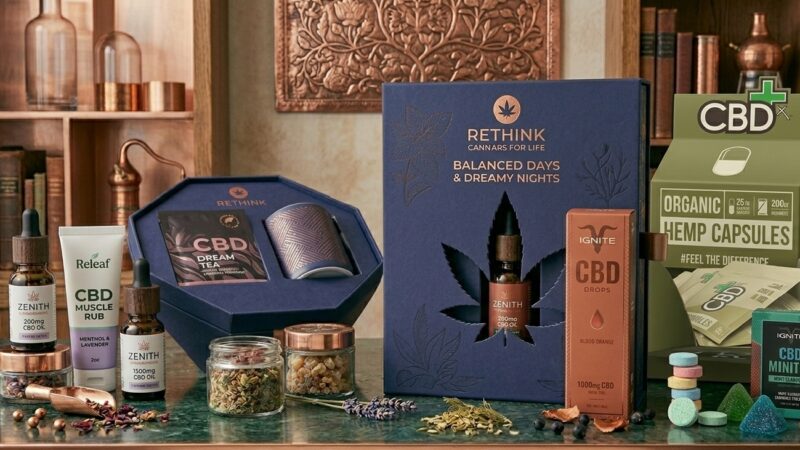 Luxury custom CBD oil packaging boxes featuring gold foil stamping, matte black lamination, and glossy spot UV finishes for a premium retail look.
